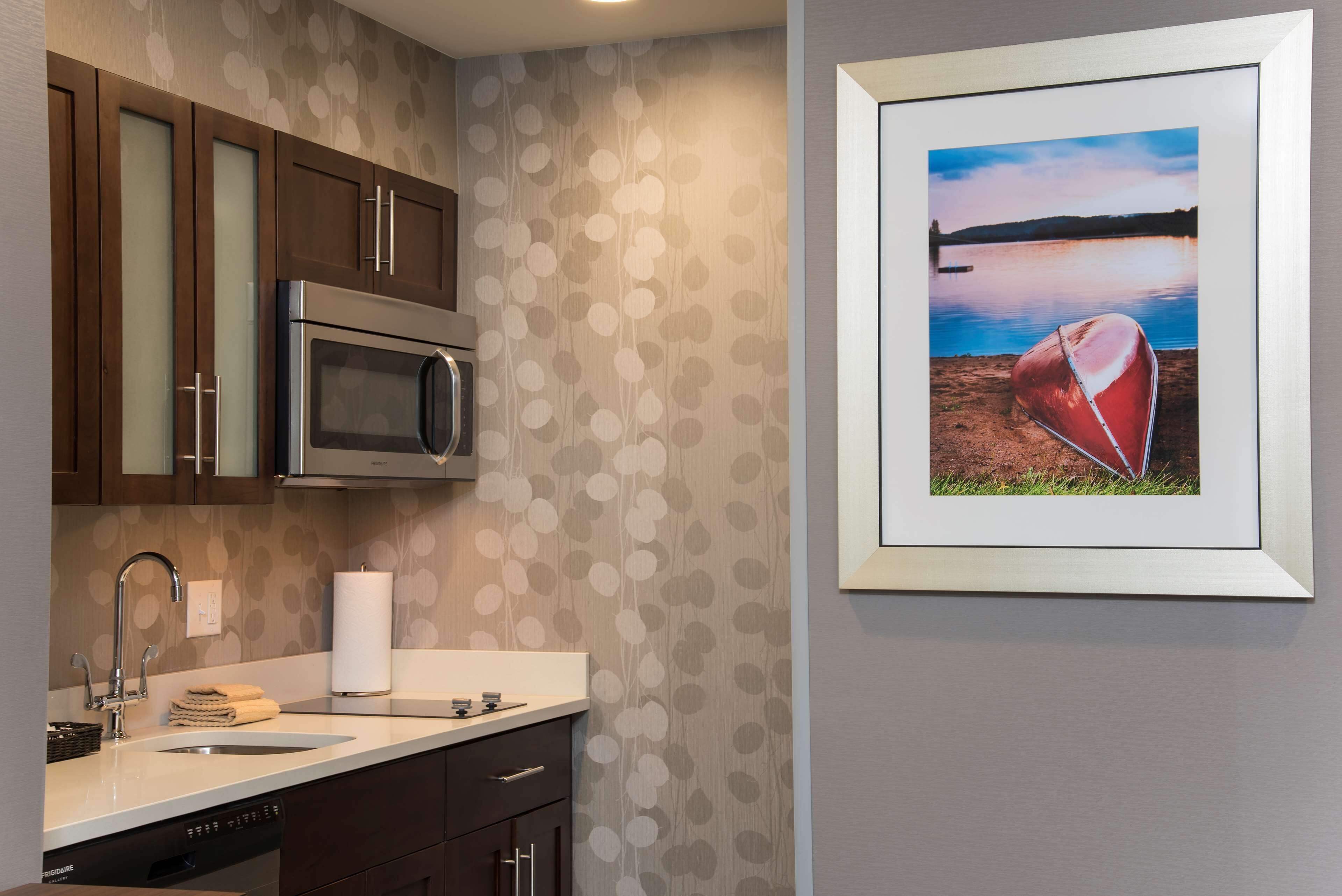 full-sized fridge, microwave, stovetop, dishwasher