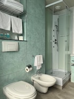 Standard Double Room | Minibar, in-room safe, desk, iron/ironing board