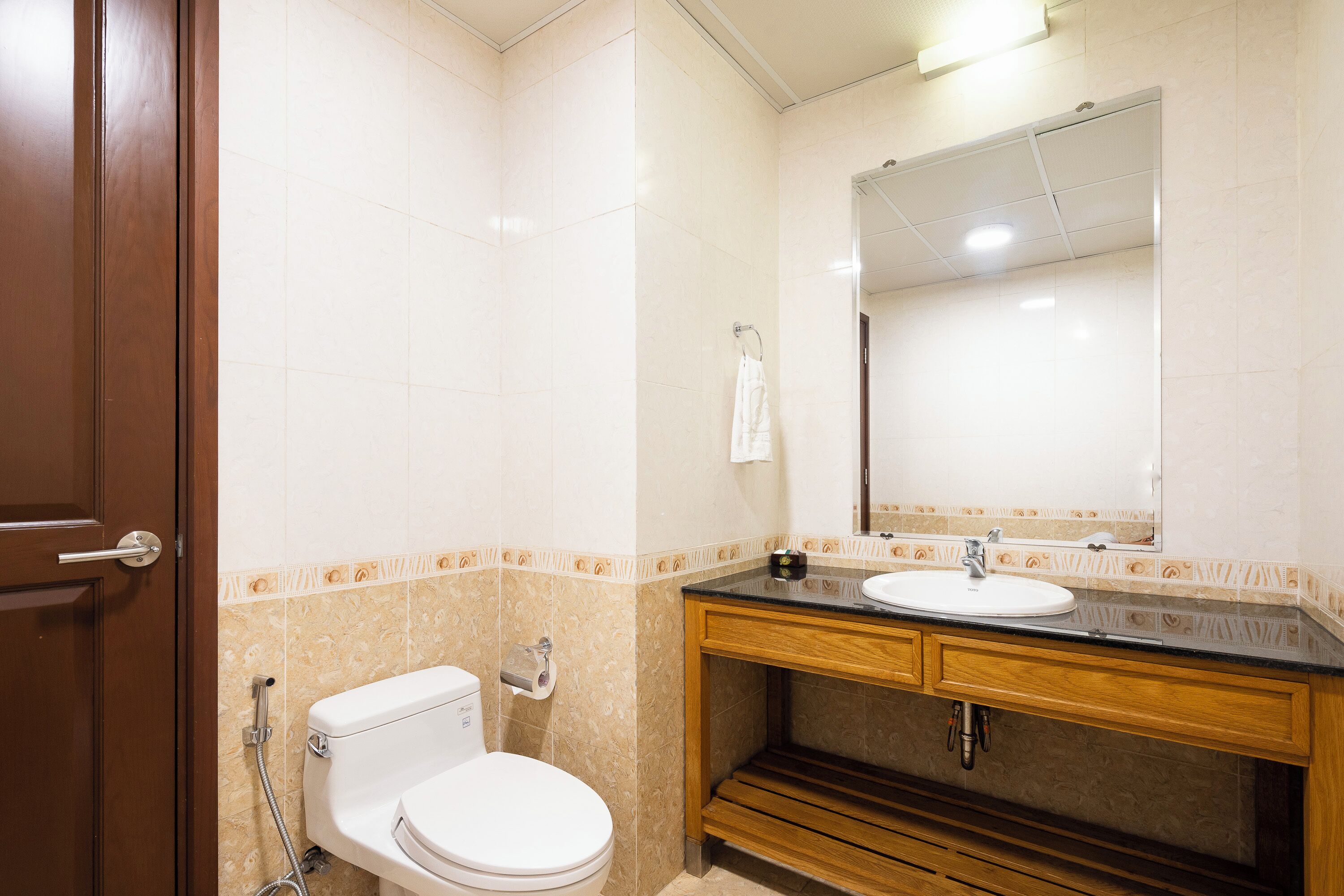 business suite | bathroom | designer toiletries, slippers, towels