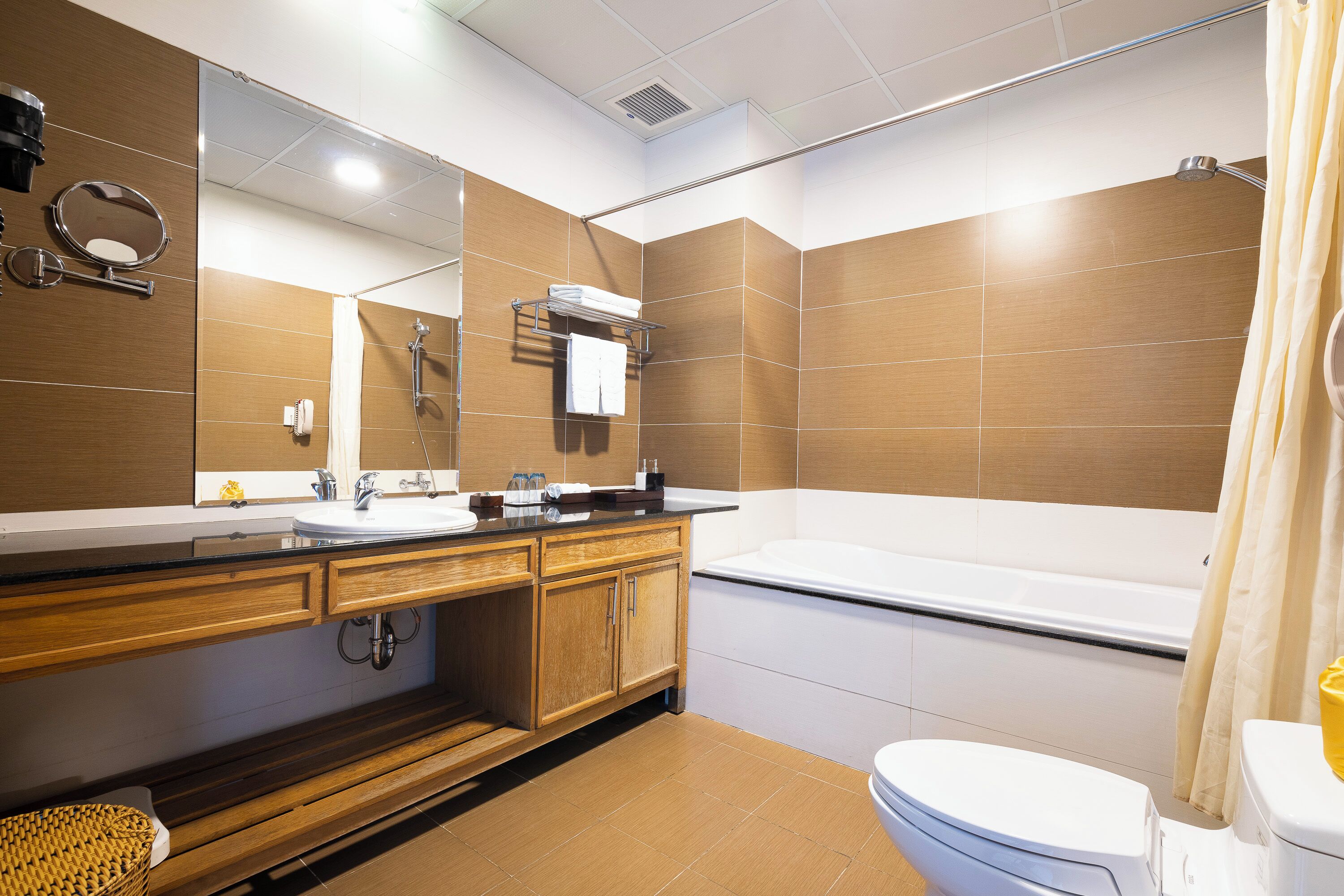 deluxe twin room | bathroom | designer toiletries, slippers, towels