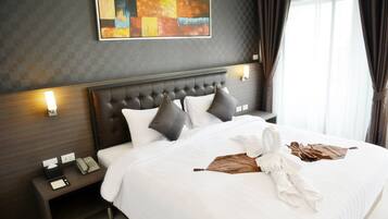 Premium bedding, in-room safe, individually furnished, blackout drapes