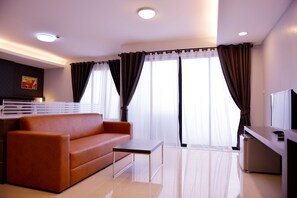 Habitación triple Deluxe | Vistas a la ciudad