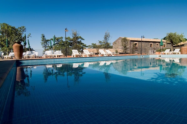 Outdoor pool, pool umbrellas, pool loungers