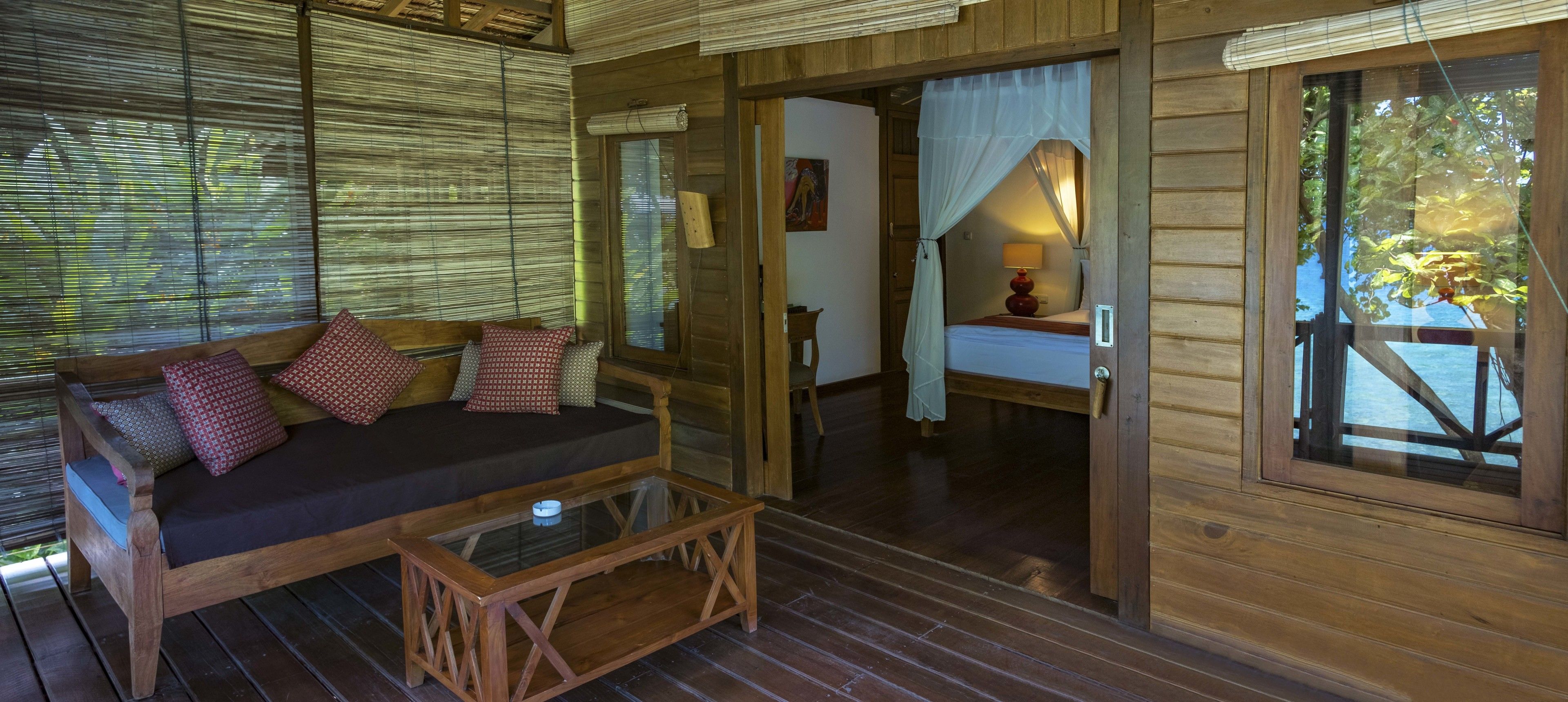 deluxe double room, 1 king bed, terrace, sea facing | living area | fireplace