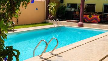Outdoor pool, pool umbrellas, pool loungers