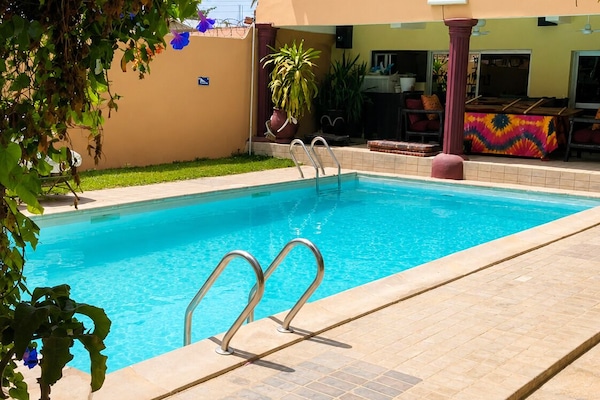 Outdoor pool, pool umbrellas, pool loungers