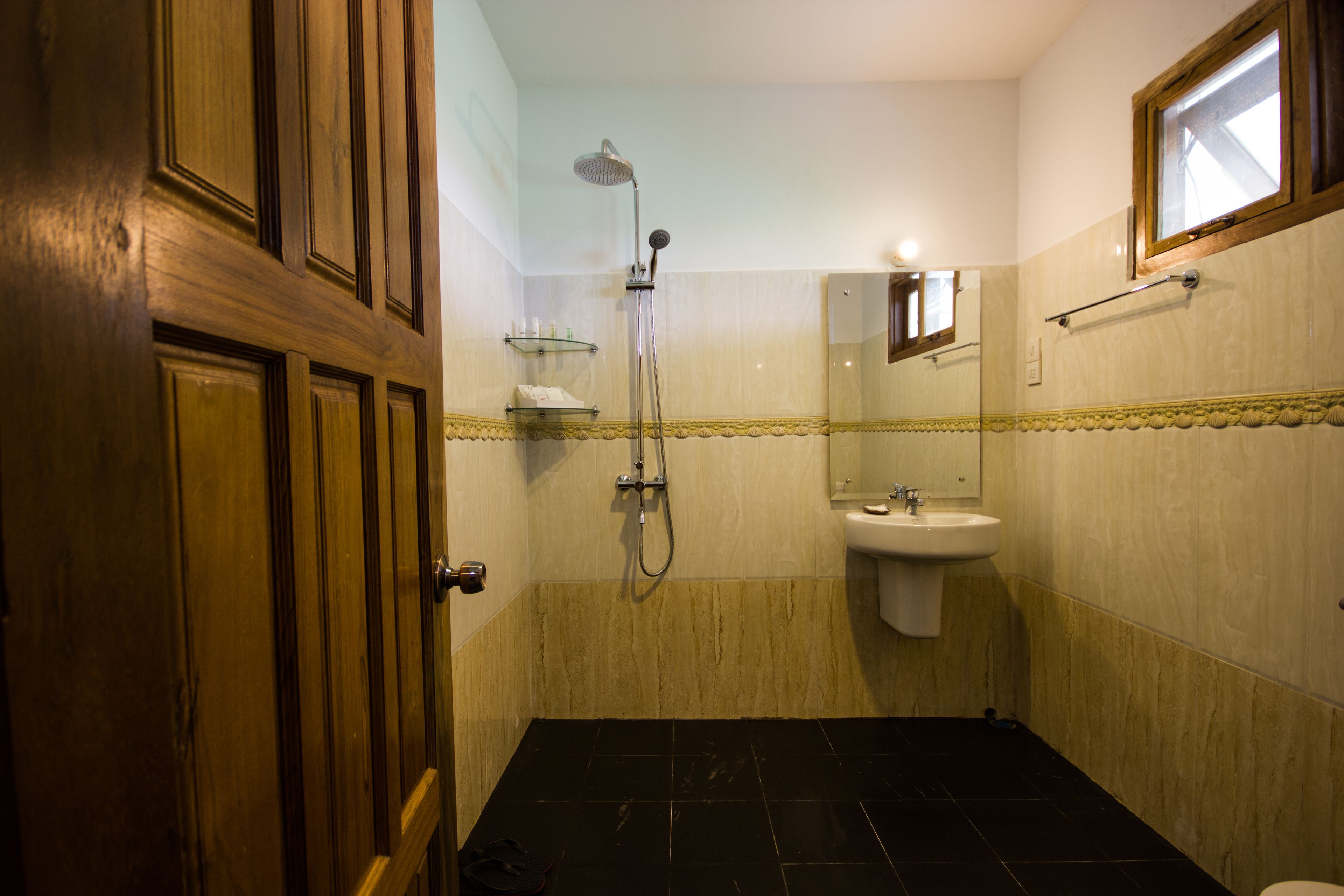 deep-soaking bathtub, rainfall showerhead, free toiletries, hair dryer