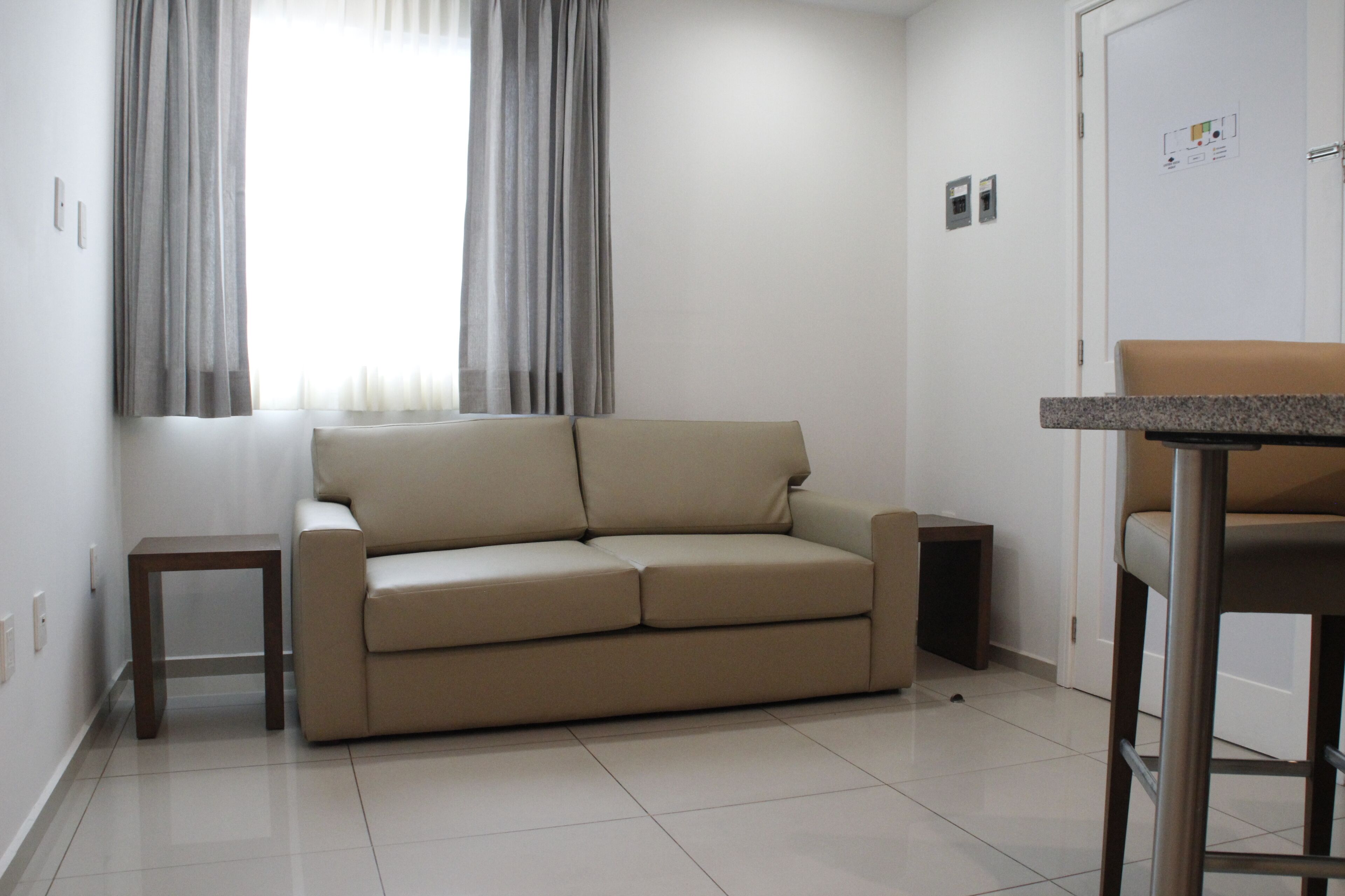 deluxe room | living room | 32-inch flat-screen tv with cable channels, tv