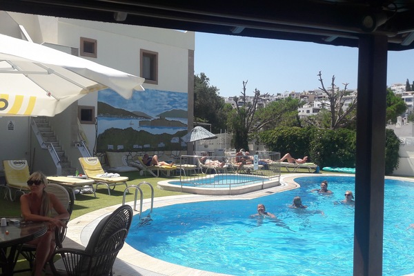 Seasonal outdoor pool, open 9:00 AM to 7 PM, pool umbrellas