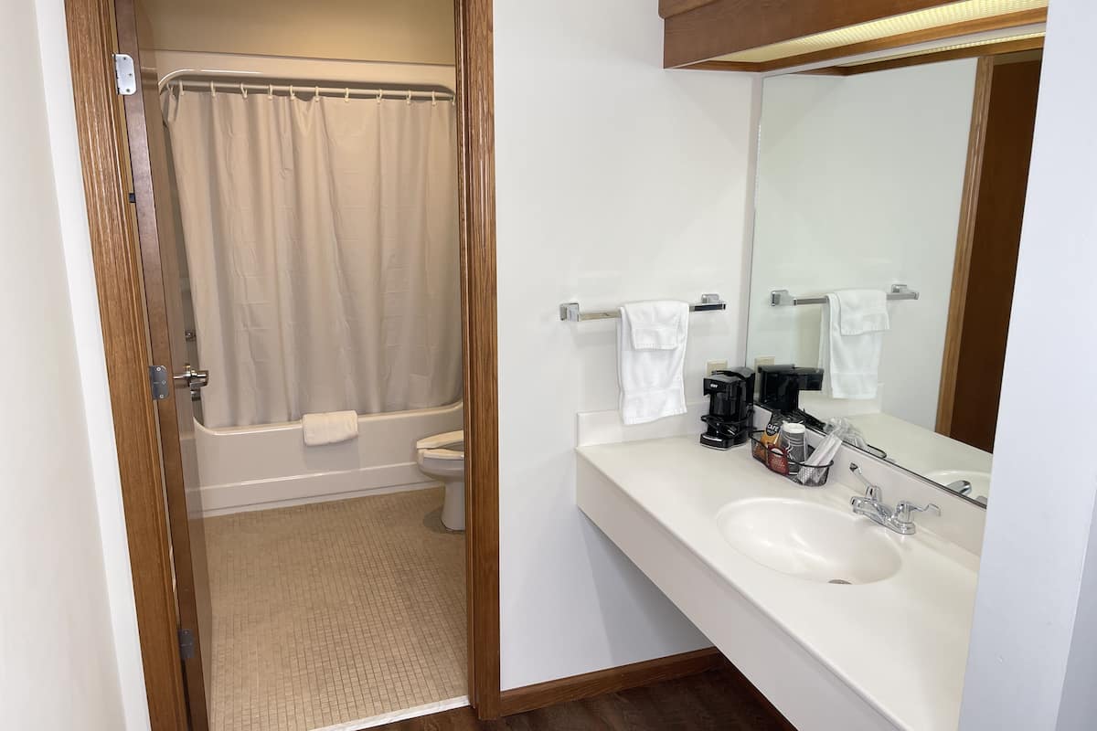 grand room, 2 queen beds | bathroom | free toiletries, hair dryer, towels