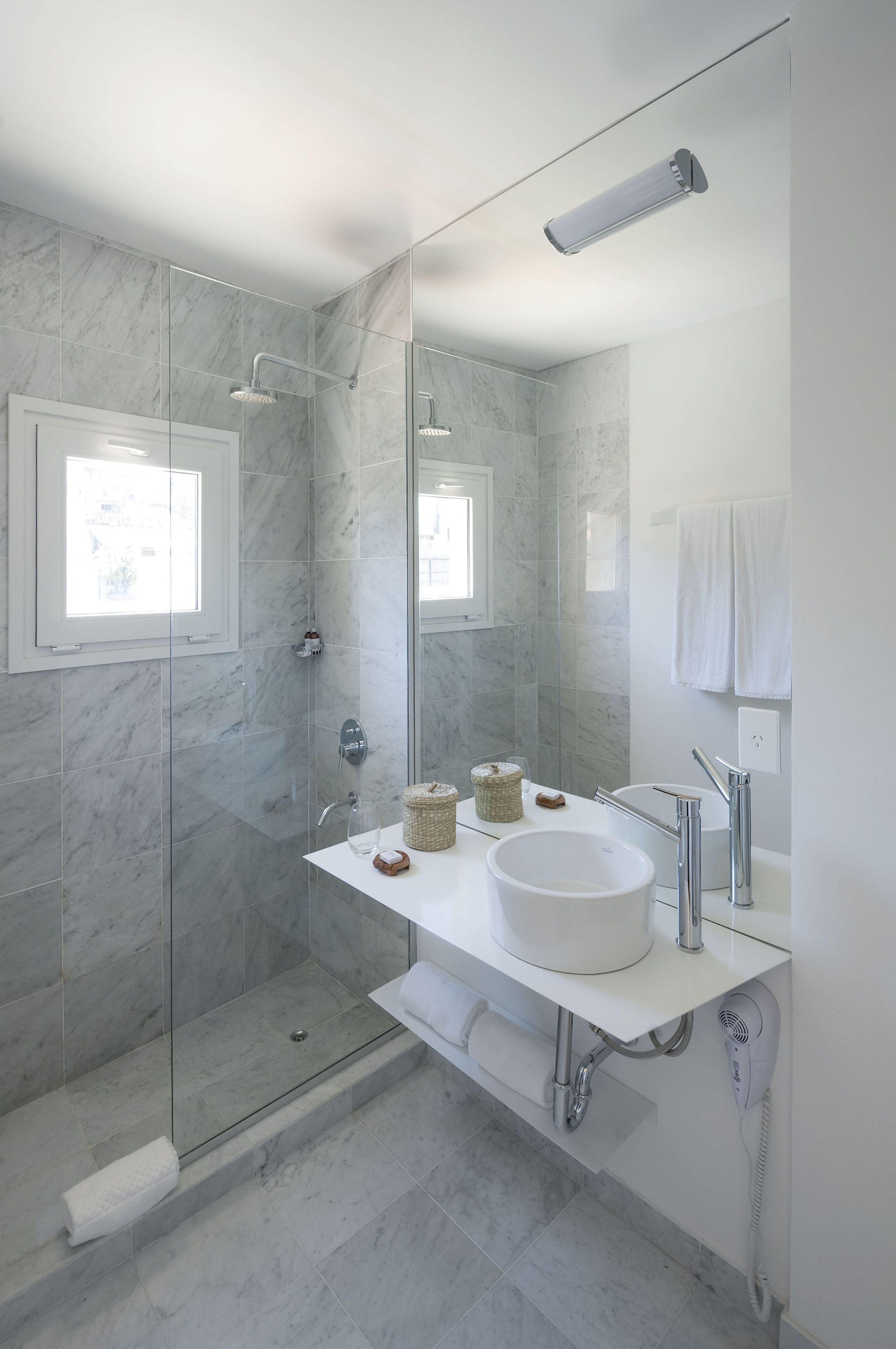 junior studio suite | bathroom | rainfall showerhead, free toiletries, hair dryer, bidet