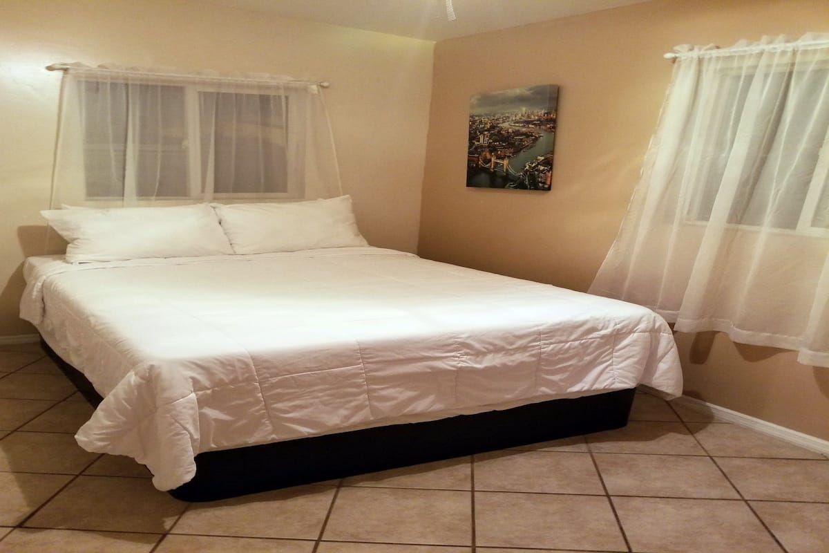 Deluxe Room, Multiple Beds | Desk, iron/ironing board, free WiFi, bed sheets
