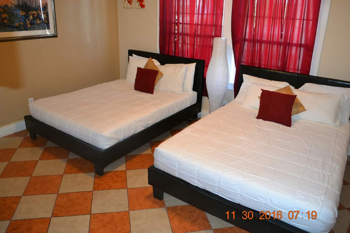 Family Studio, 2 Queen Beds, Kitchenette | Desk, iron/ironing board, free WiFi, bed sheets