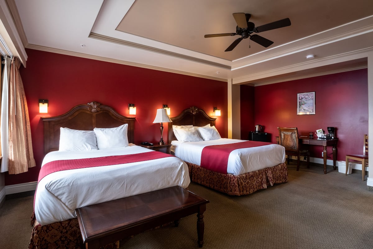 standard room, 2 queen beds, lake view | individually decorated, individually furnished, desk, laptop workspace