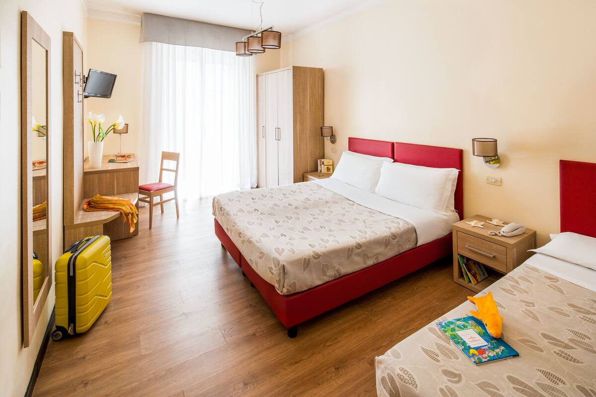 Comfort Triple Room, Balcony | Minibar, in-room safe, desk, blackout drapes