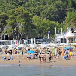 On the beach, sun loungers, beach umbrellas