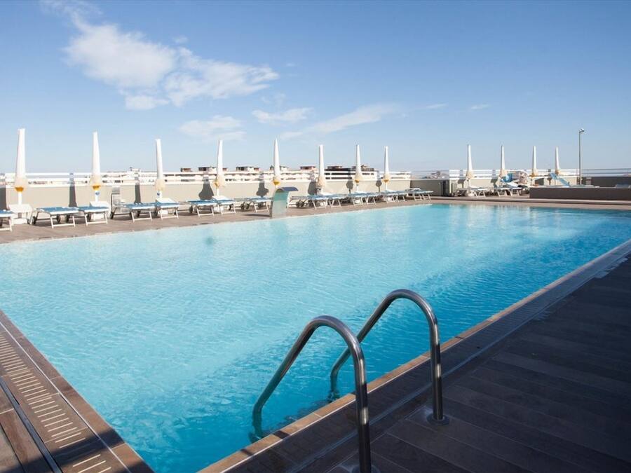 Outdoor pool, a rooftop pool, sun loungers