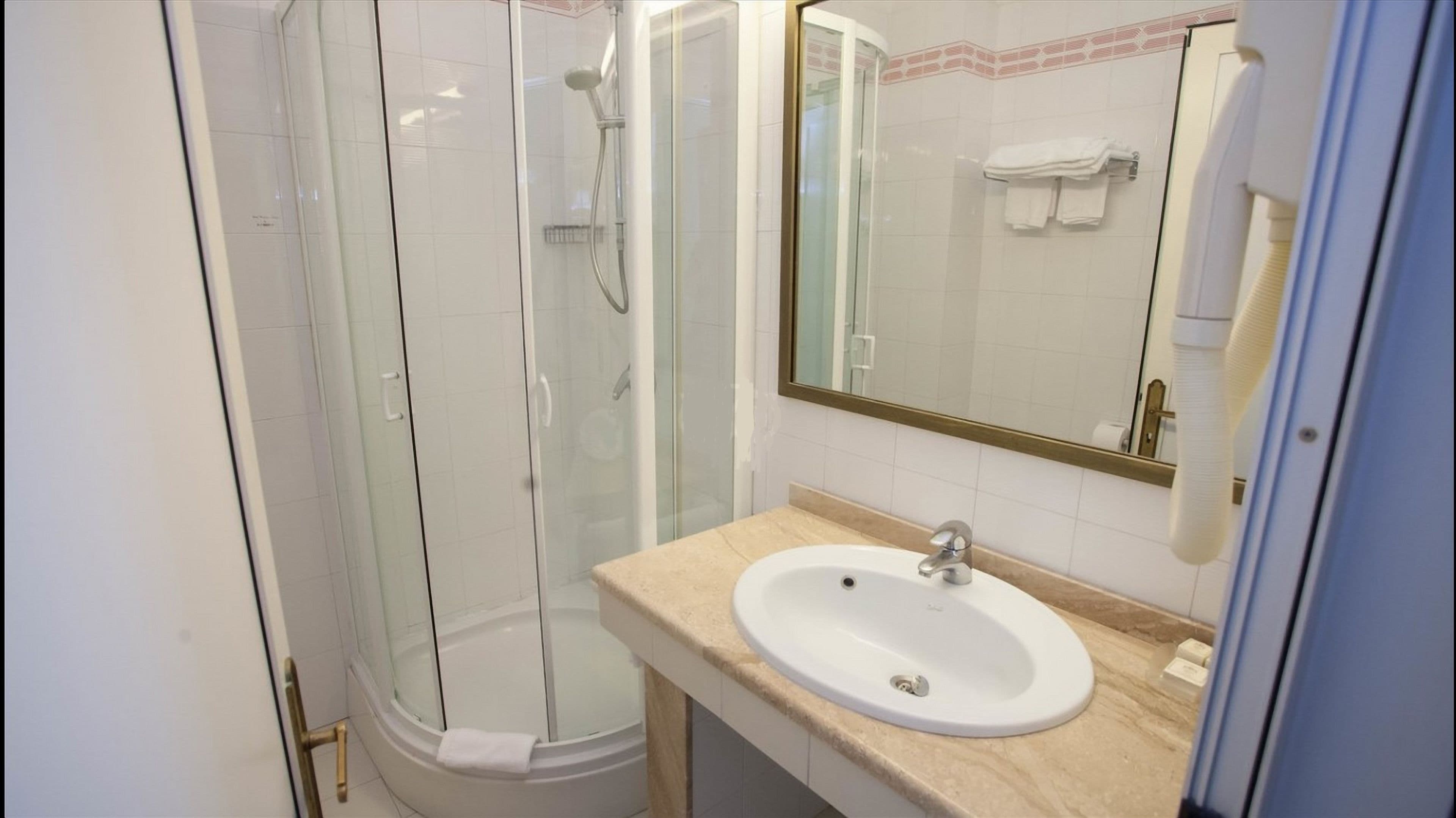 free toiletries, hair dryer, slippers, towels