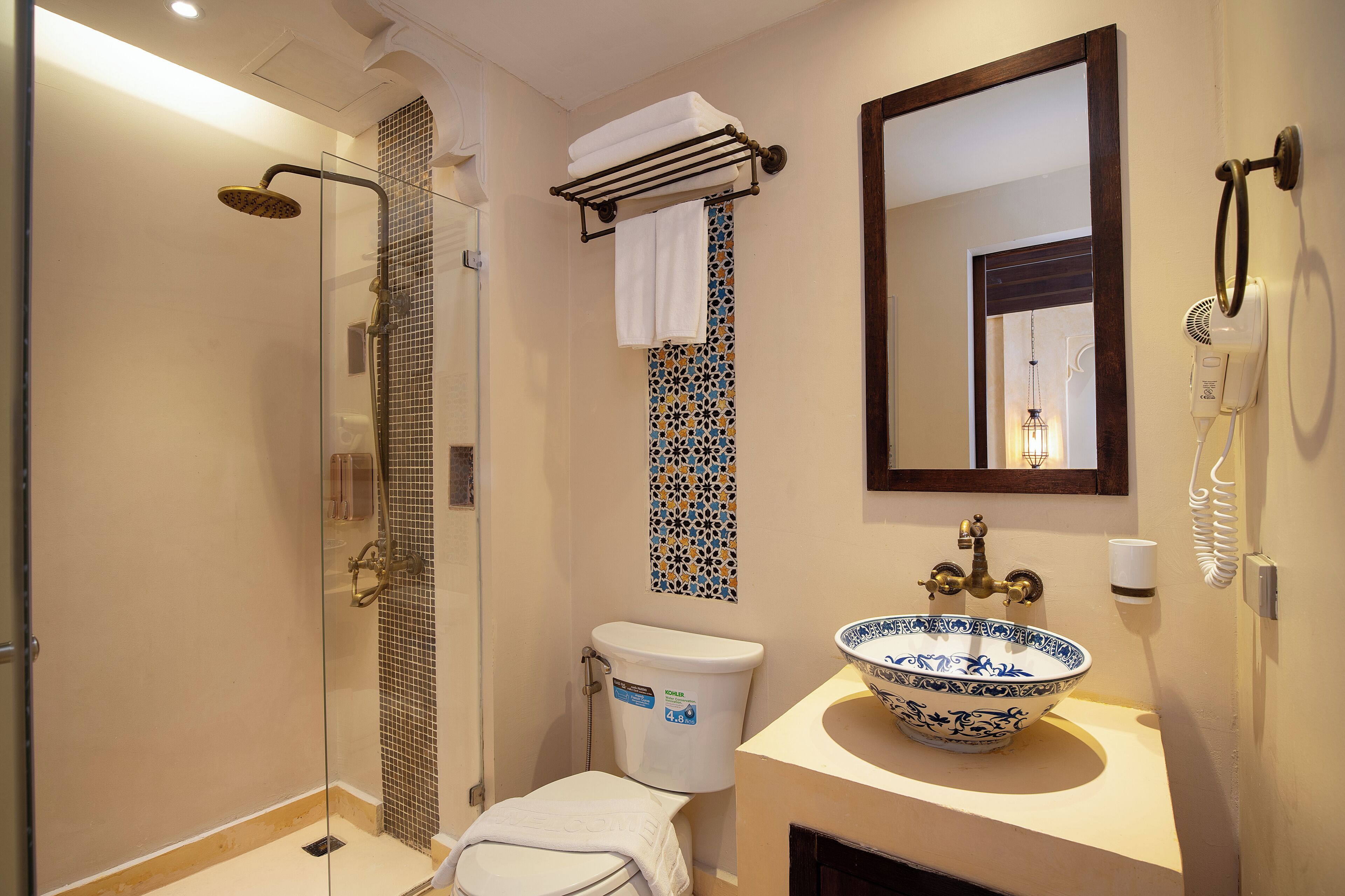 deluxe twin room | bathroom | shower, free toiletries, hair dryer, slippers