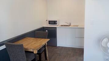 Deluxe King or Twin Studio | In-room dining