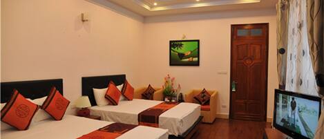 Premium Triple Room, City View | 1 bedroom, minibar, in-room safe, desk