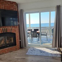 Panoramic Suite, Multiple Bedrooms, Sea View | Living area | TV