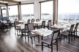 Breakfast, lunch, dinner served; beach views