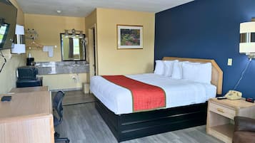 Habitación, 1 cama King size | Escritorio, wifi gratis y ropa de cama