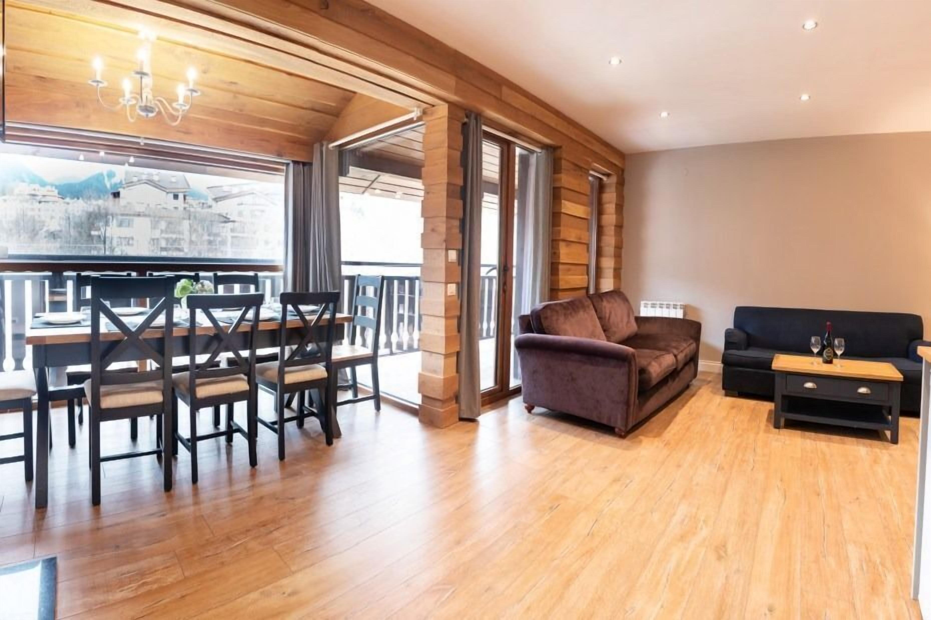 Deluxe Apartment, 3 Bedrooms, Kitchen (Free Sauna, Steambath & Jacuzzi) | Living area | Flat-screen TV