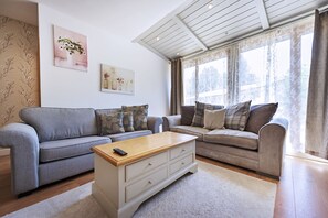 Apartment, 2 Bedrooms | Living area | Flat-screen TV, fireplace - Mountain View Resort (Bansko)