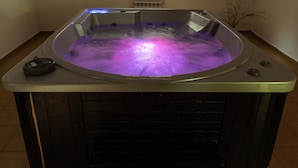 A hot tub with a control panel and a small plant beside it. - Mountain View Resort (Bansko)