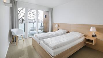 Suite Standar, 1 kamar tidur | Tirai kedap cahaya, Wi-Fi gratis, dan seprai linen