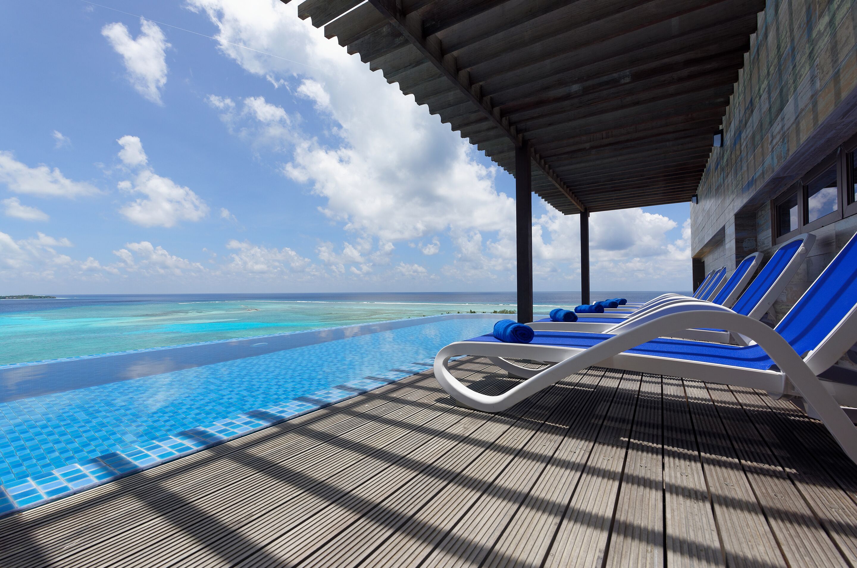 Indoor pool, open 10:00 AM to 8:00 PM, pool loungers