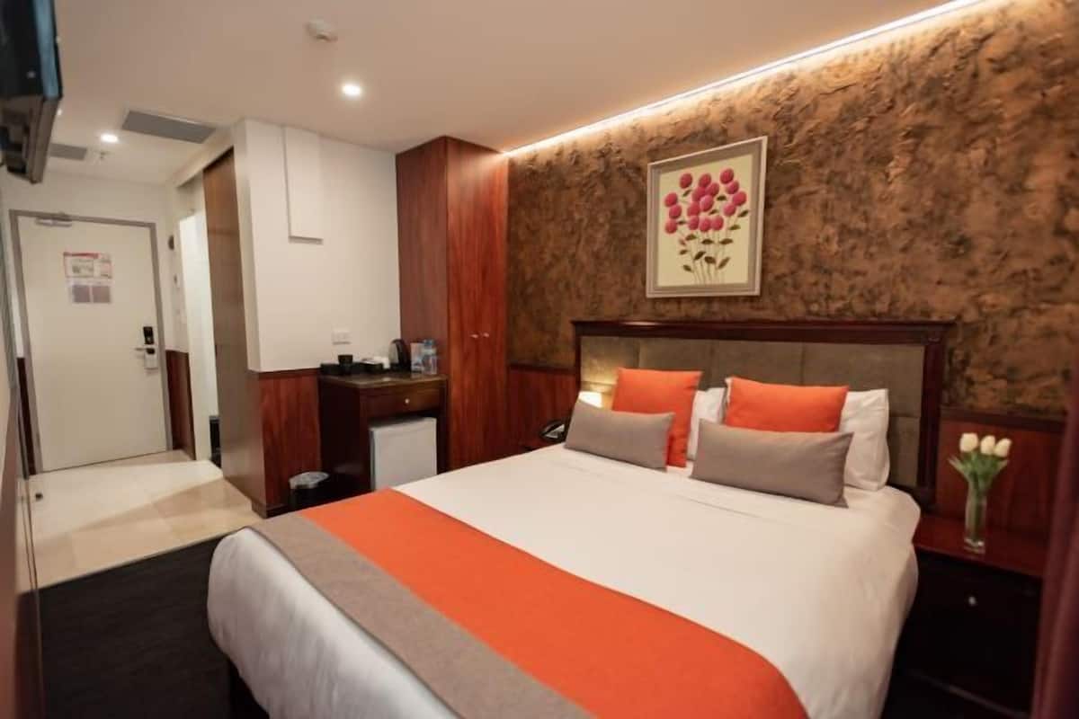 Colchones con pillow-top, minibar y caja de seguridad en la habitación