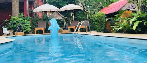 Outdoor pool, open 8:30 AM to 9 PM, pool umbrellas, pool loungers
