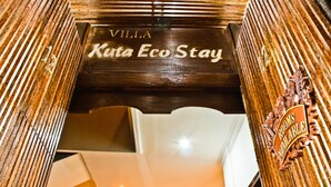 A wooden sign with "Villa Kuta Eco Stay" written on it, indicating the name of the hotel. - Kuta EcoStay (Kuta)