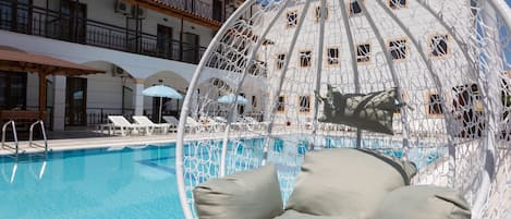 Outdoor pool, pool umbrellas, pool loungers