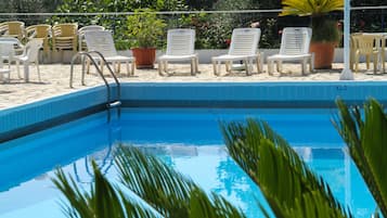Outdoor pool, open 8:30 AM to 7:00 PM, sun loungers