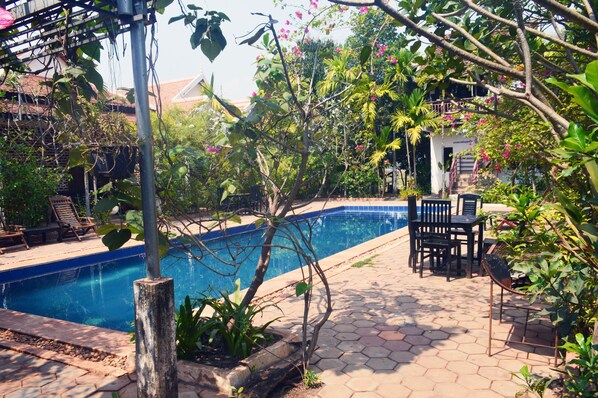 Outdoor pool, pool umbrellas, pool loungers