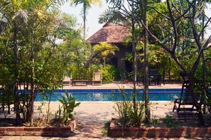 Outdoor pool, pool umbrellas, pool loungers