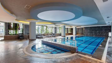Indoor pool, 4 outdoor pools, open 9:00 AM to 5:00 PM, pool umbrellas
