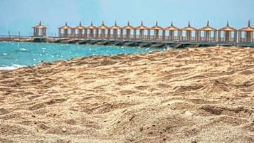 Private beach, sun-loungers, beach umbrellas, beach towels