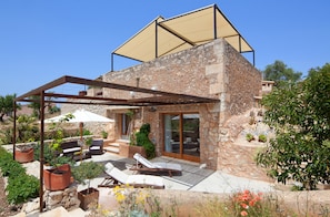 Grand Suite, 1 King Bed, Garden View, Garden Area | Garden view - Ses Cases de Fetget (Son Servera)