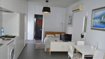 Departamento Confort | Tabla de planchar con plancha, wifi gratis y ropa de cama