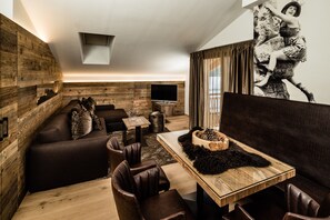 Télévision à écran plat, lecteur de DVD, chauffage par le sol