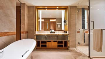 Separate tub and shower, rainfall showerhead, free toiletries