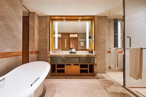 Separate bathtub and shower, rainfall showerhead, free toiletries
