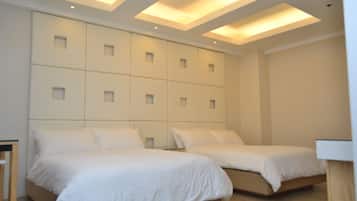 Desk, blackout drapes, iron/ironing board, rollaway beds