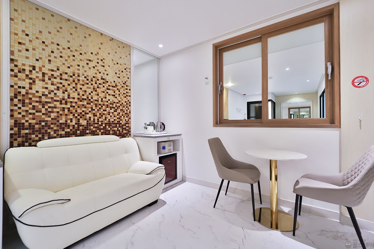 premium bedding, desk, laptop workspace, blackout curtains