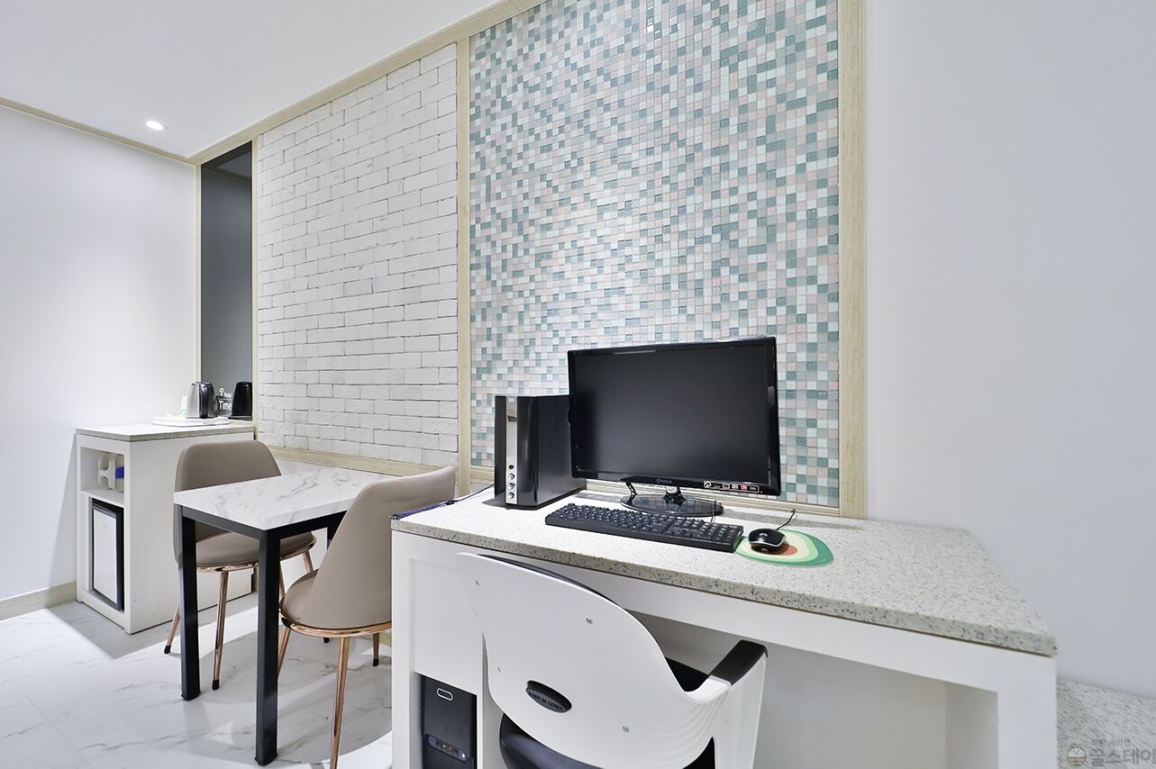 premium bedding, desk, laptop workspace, blackout curtains